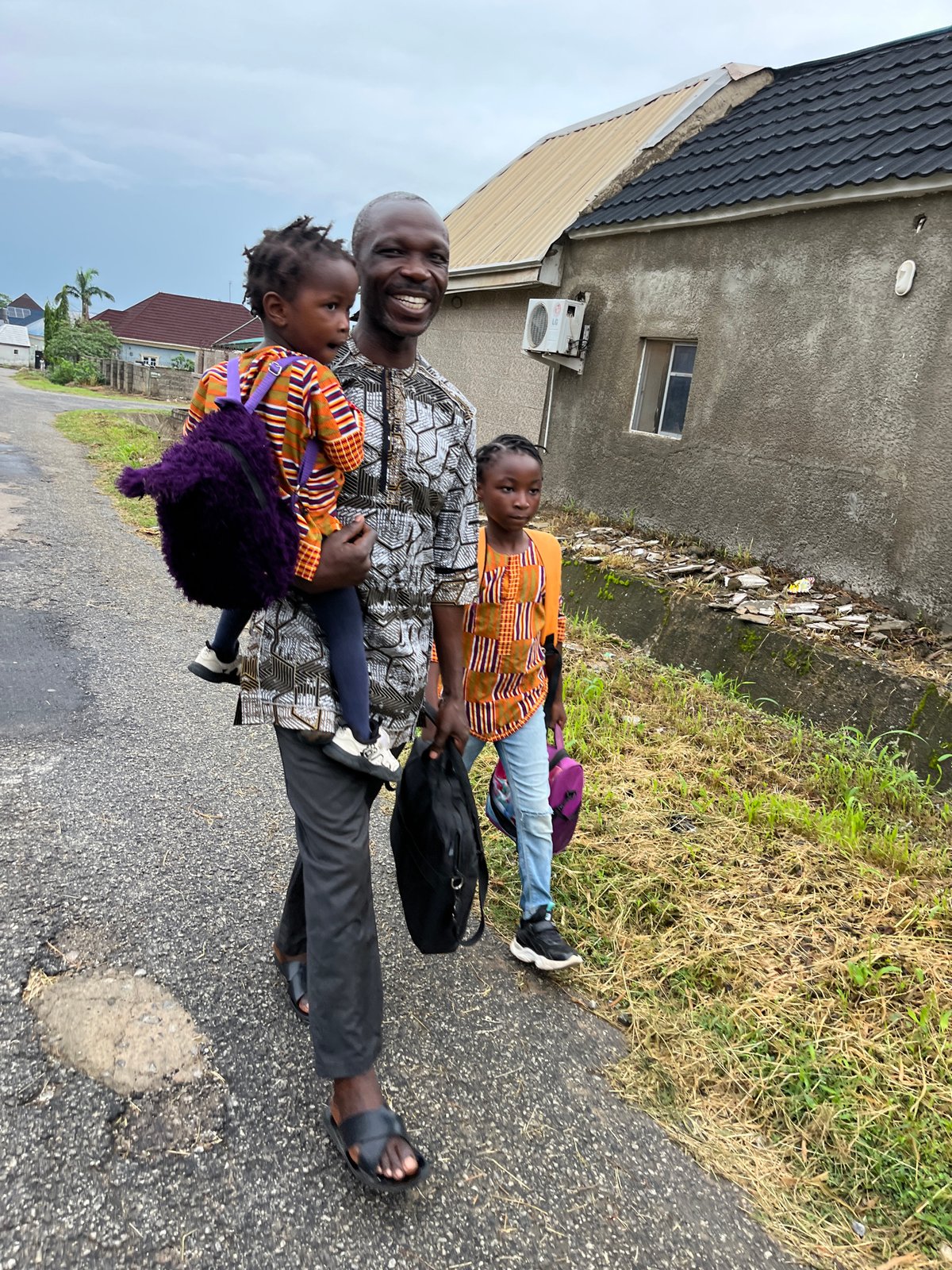 Morning street life documented across residential Abuja neighborhoods