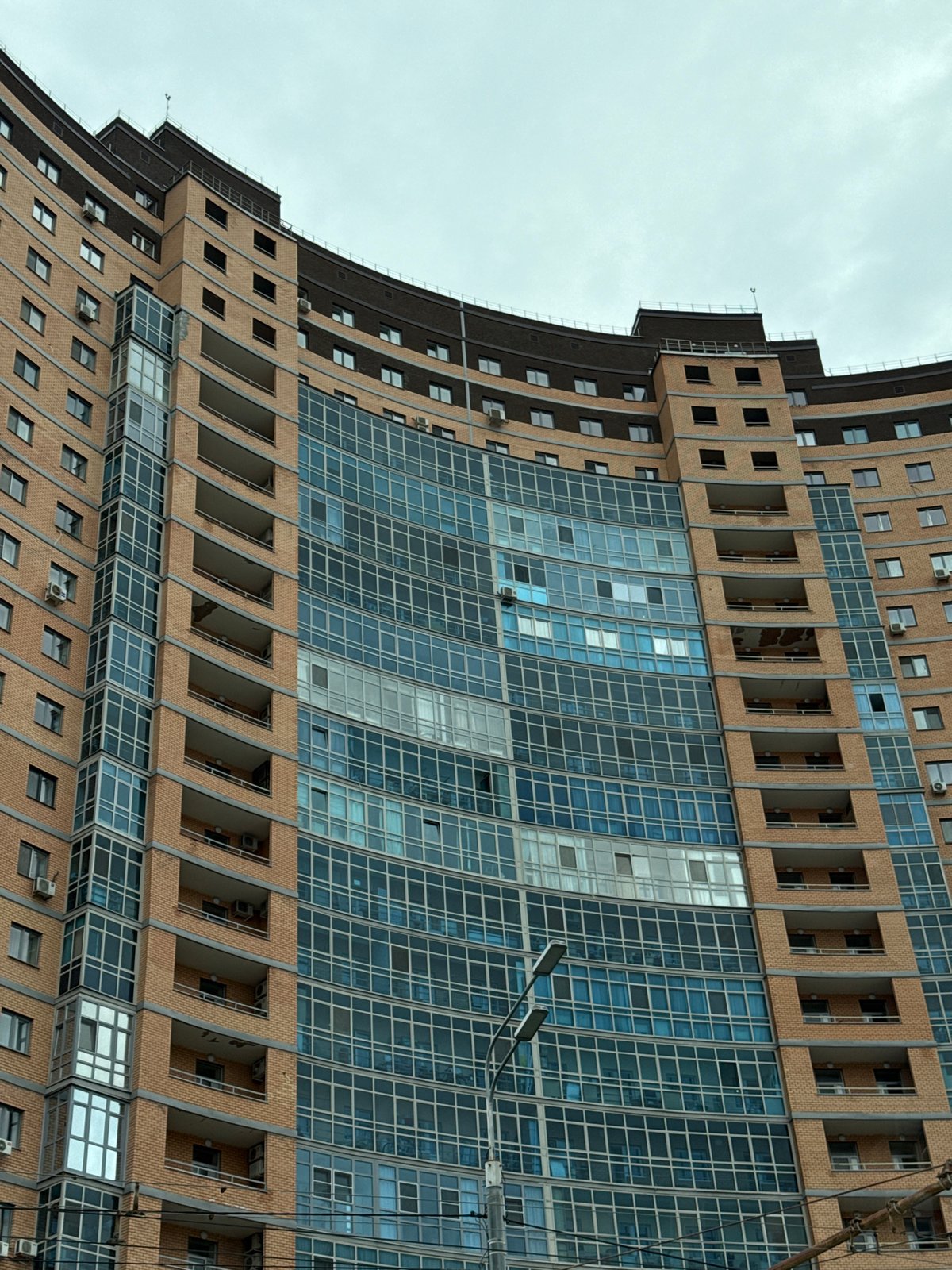 Modernist building with brick-glass facade observed in Kazan