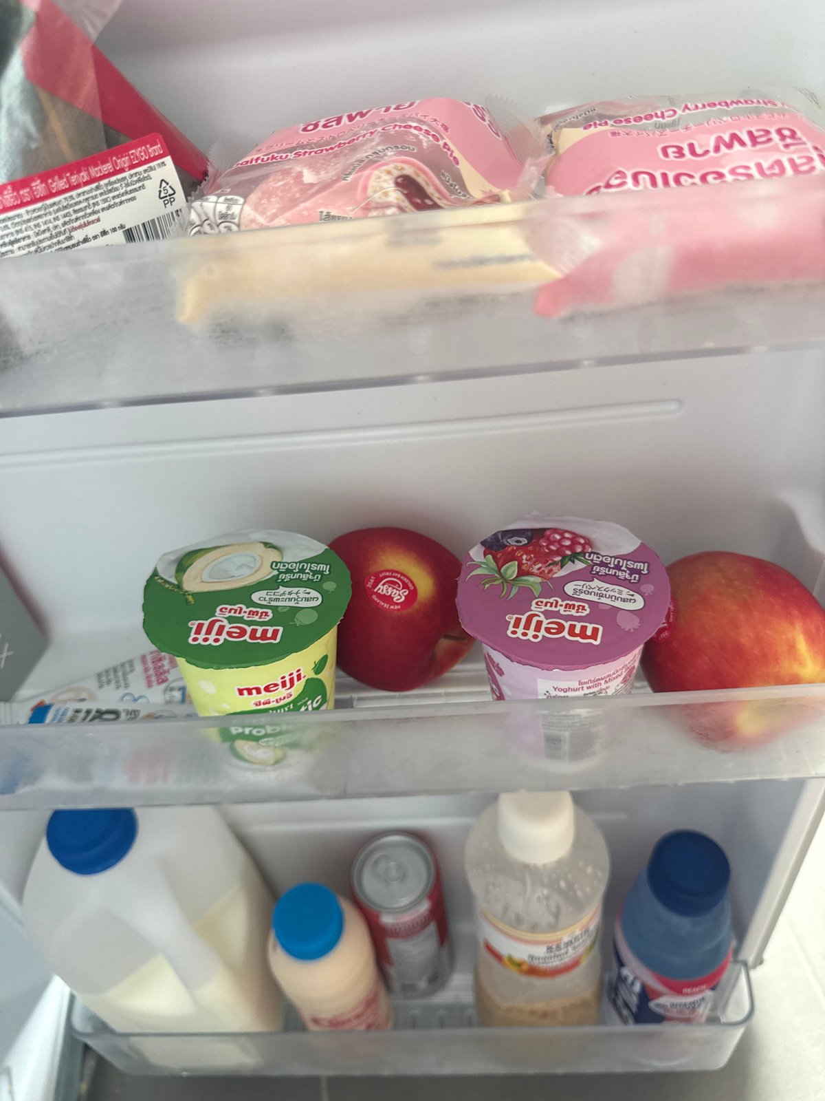 Fridge contents and a gold LEGO minifigure at home in Phuket