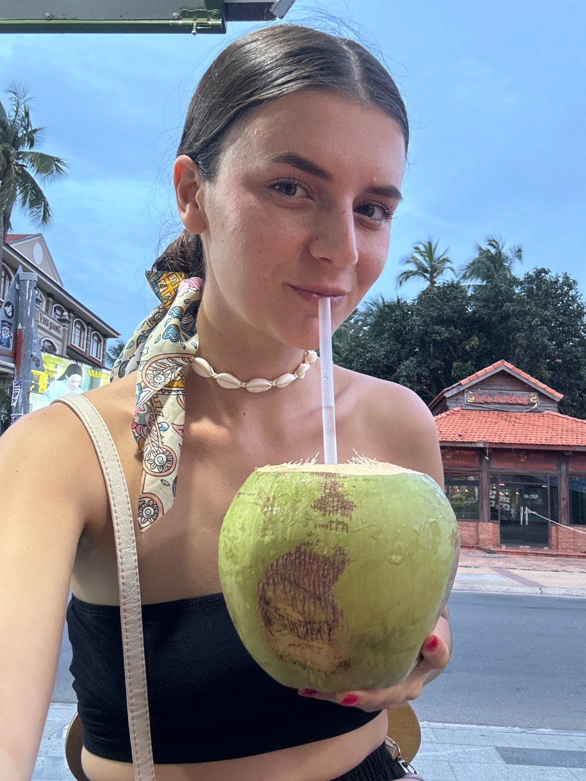 Morning café stop in Phan Thiết — drinks, souvenirs, cat ceramics