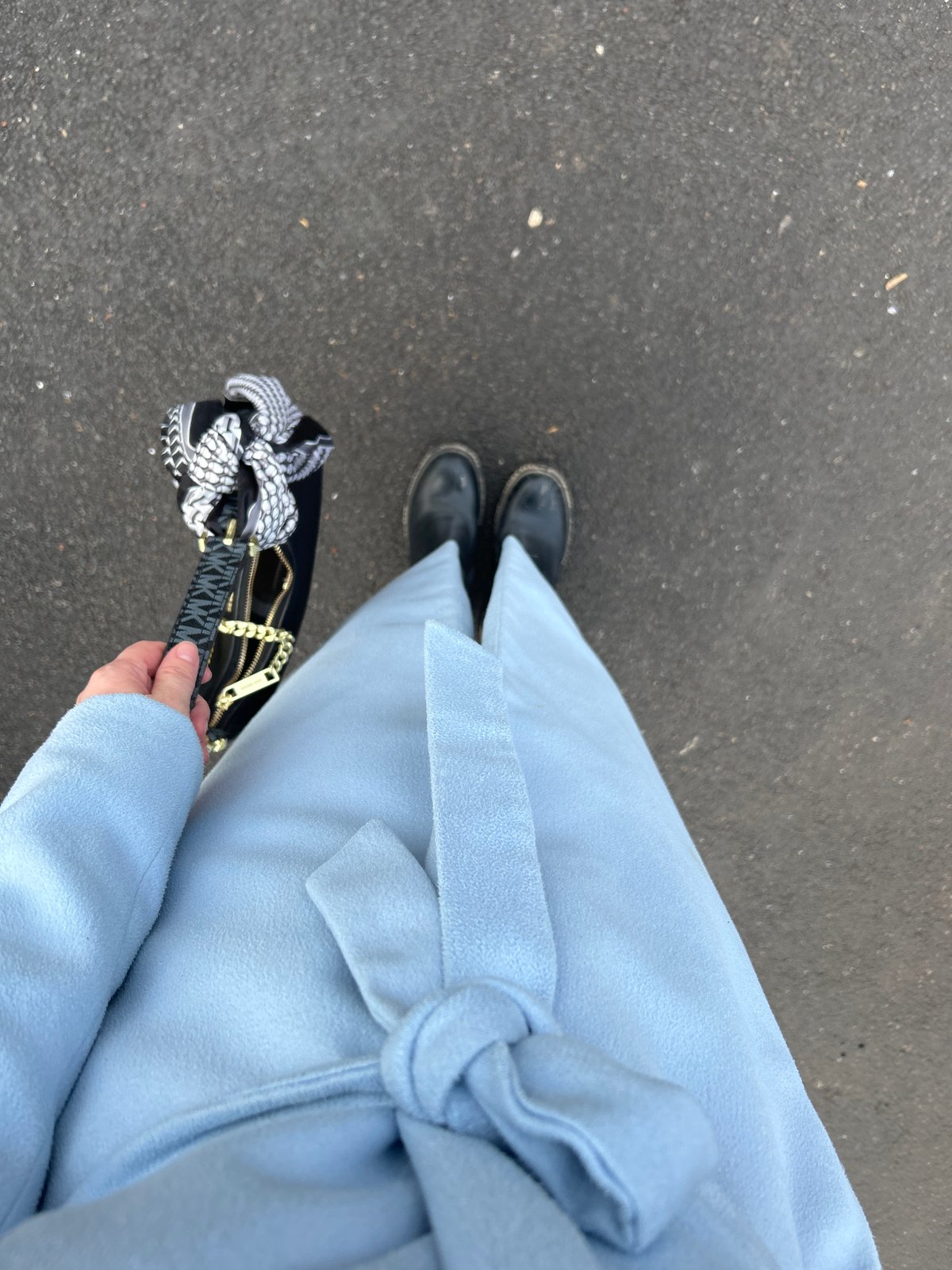 Person in blue coat observed on Ufa street