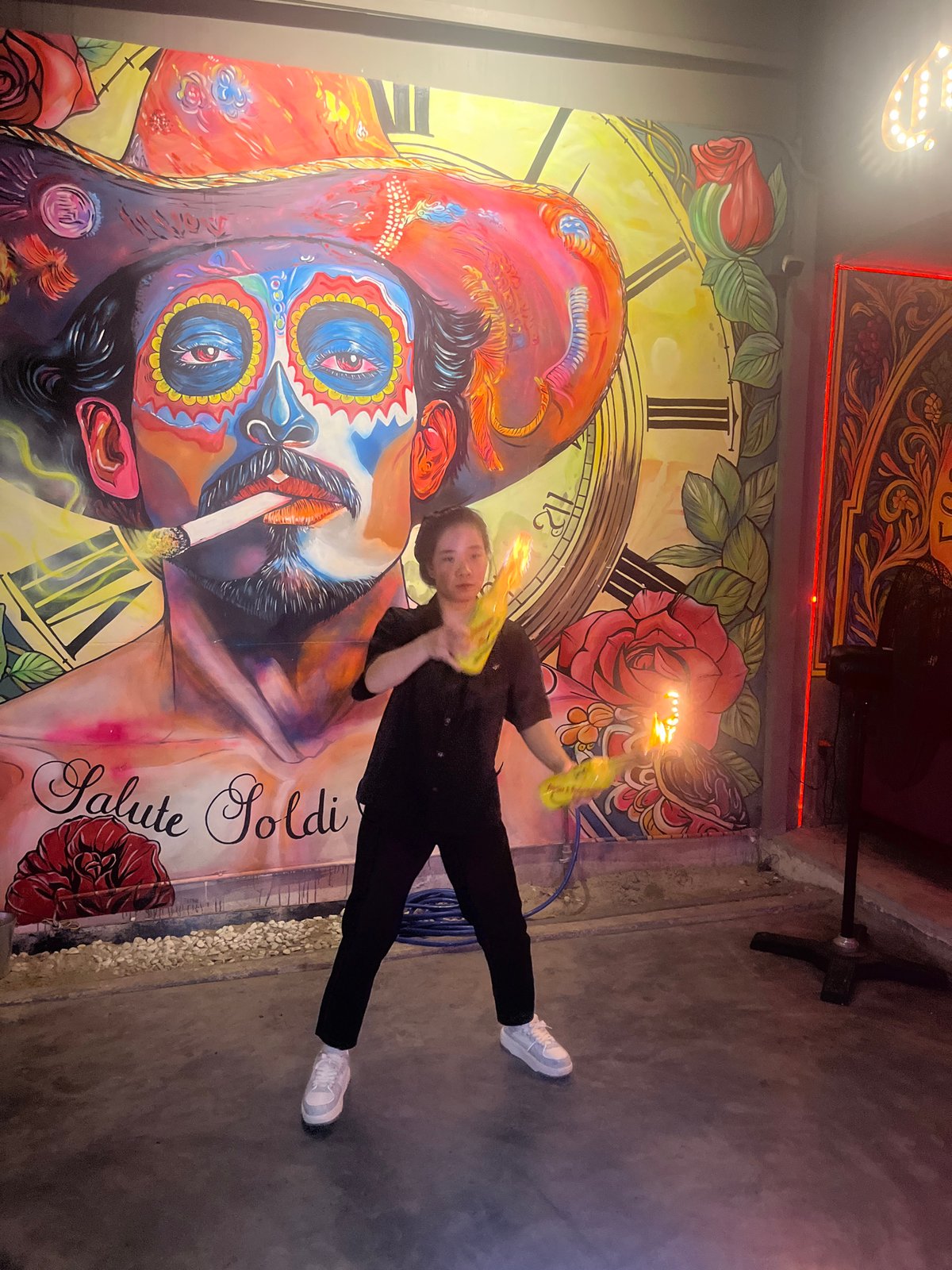 Fire juggler performs at decorated Da Nang venue