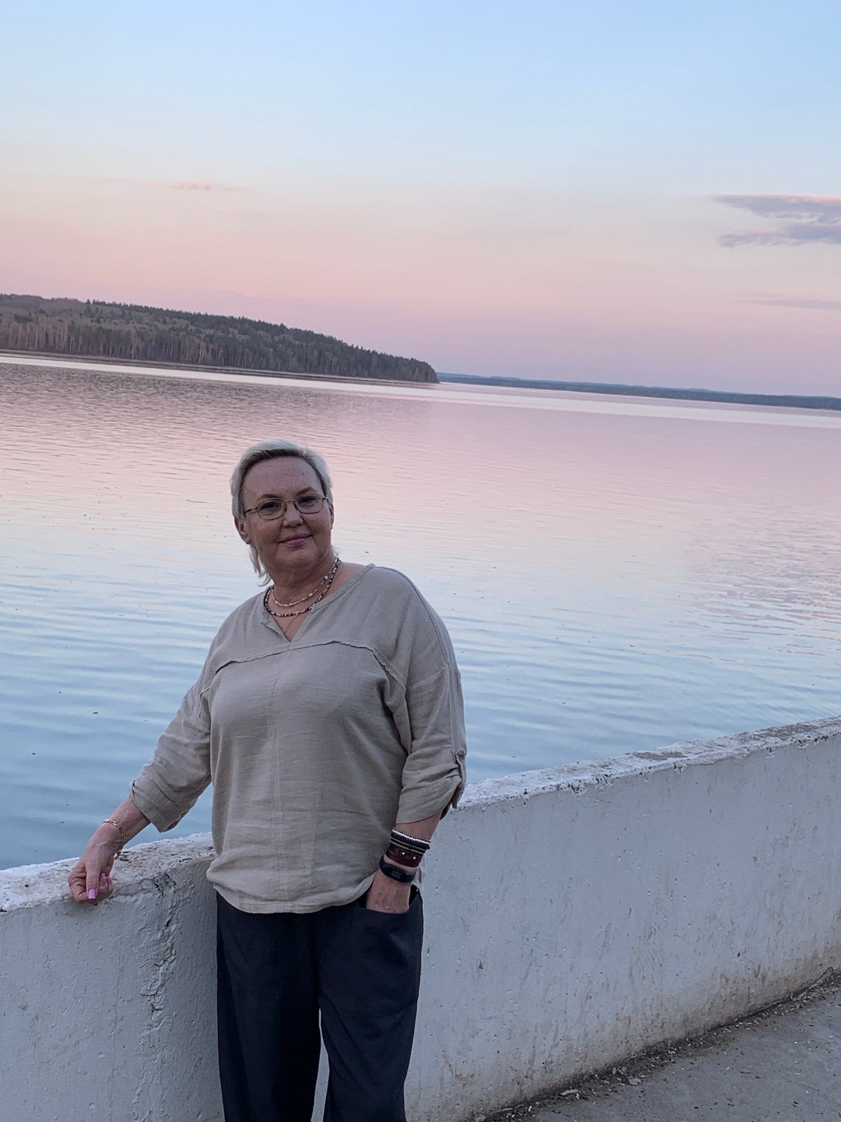 Spring afternoon life captured along Kama Reservoir waterfront in Chaikovsky