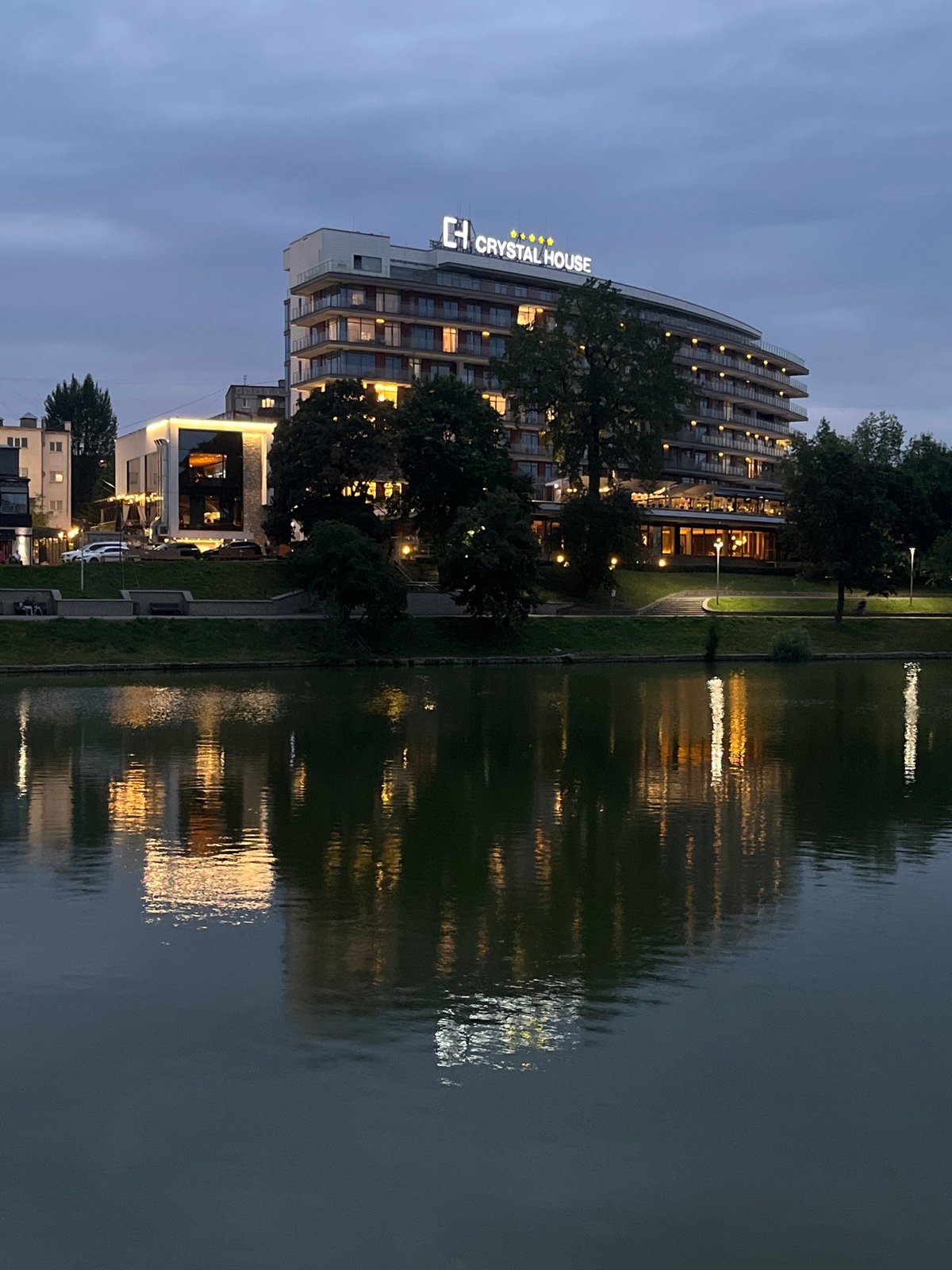 Kaliningrad waterfront buildings lit up at dusk
