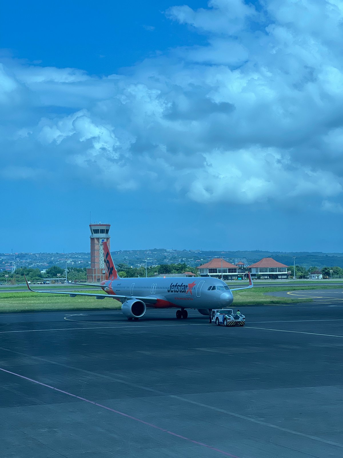 Early morning departure captured at Bali airport boarding process