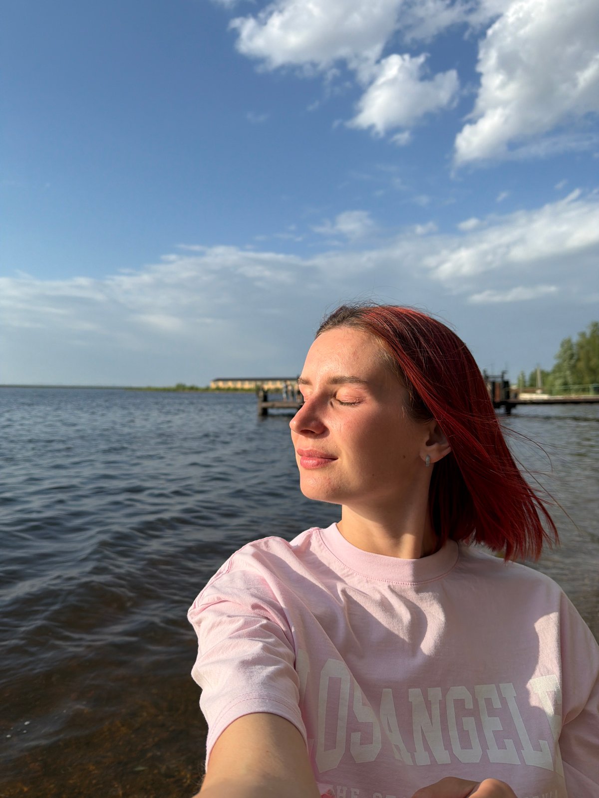Spring afternoon leisure activities documented in Chaikovsky waterfront park