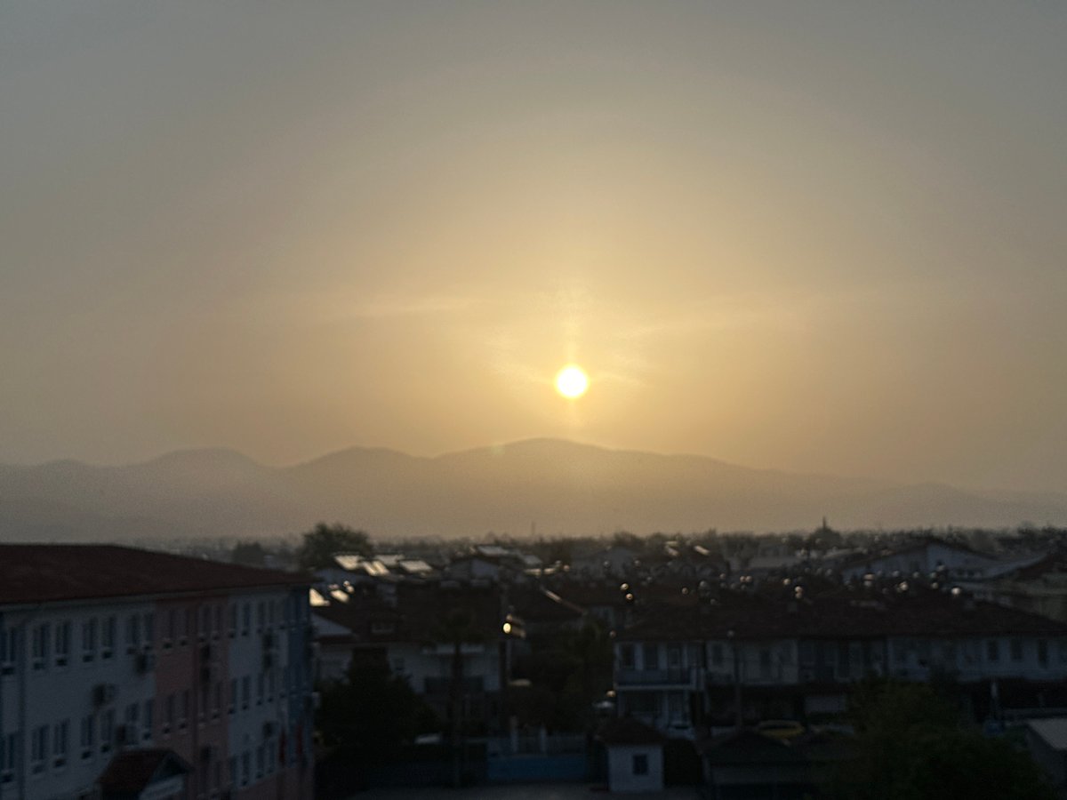 Sunset captured over residential Fethiye, Turkey cityscape