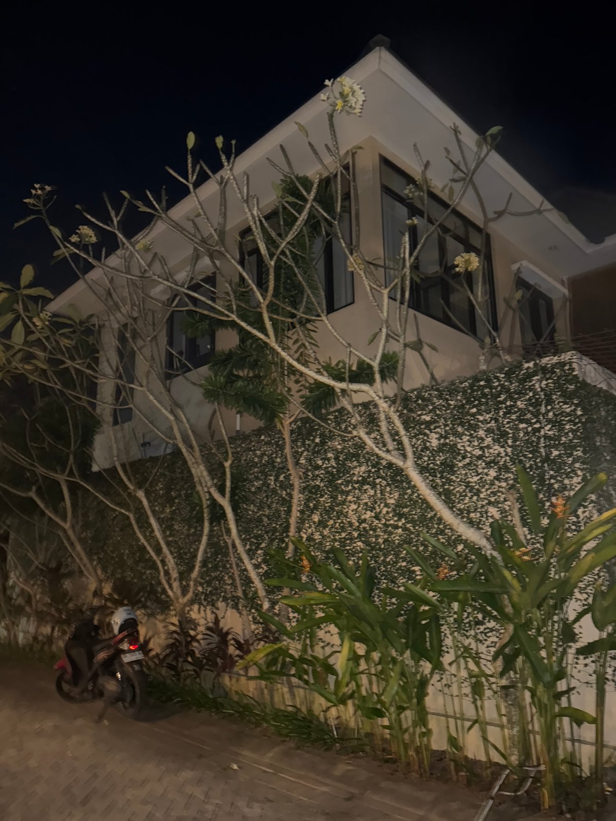 Nighttime walkthrough of a lit compound in Kuta Selatan, Bali
