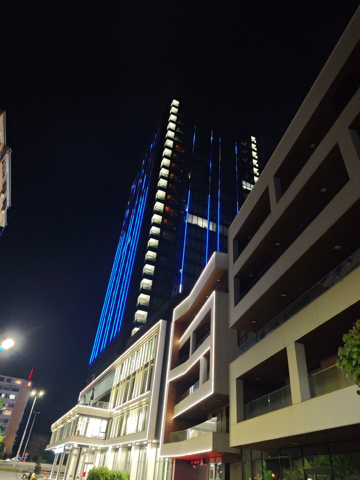 Evening architectural lighting observed in Sofia's urban skyline