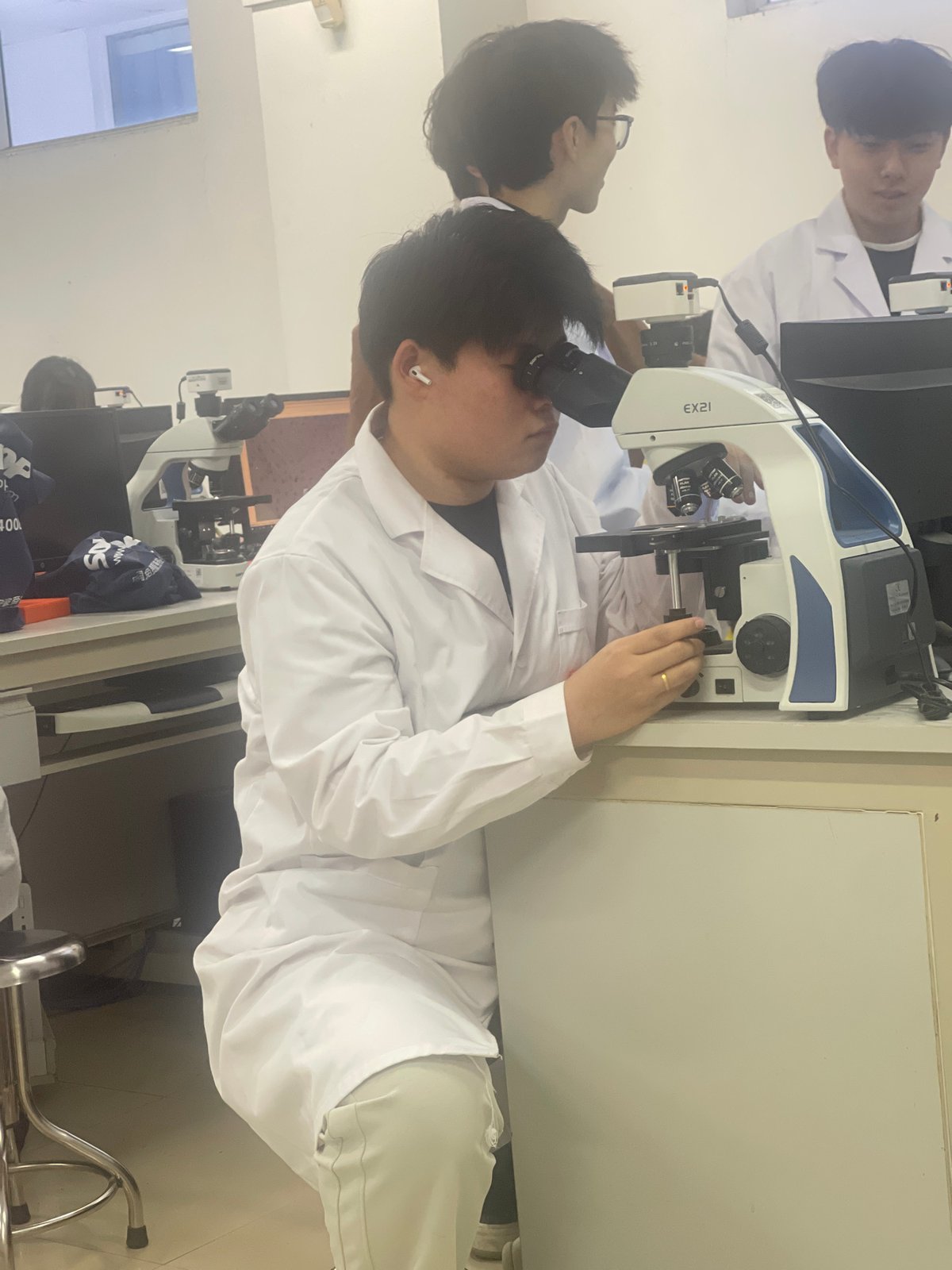 Lab workers conduct research at Chongqing High-tech facility