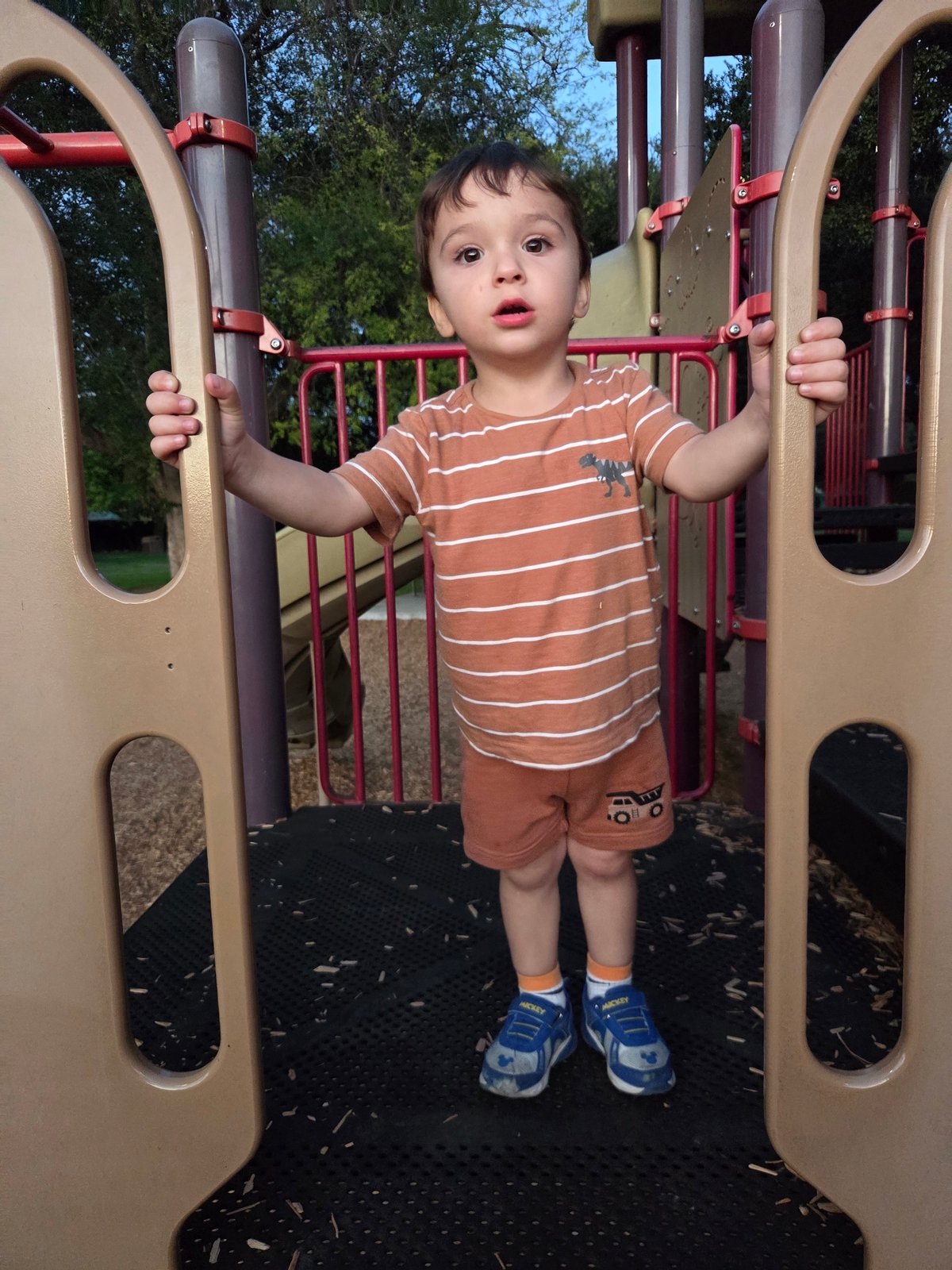 Kids playing on the Griffith Park playground at dusk