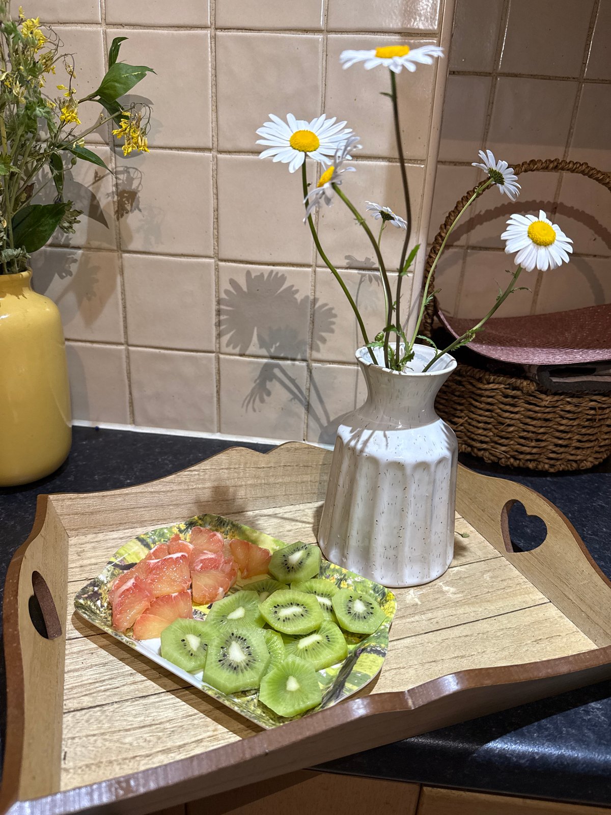 Kitchen still life with fruit and daisies observed Great Yarmouth