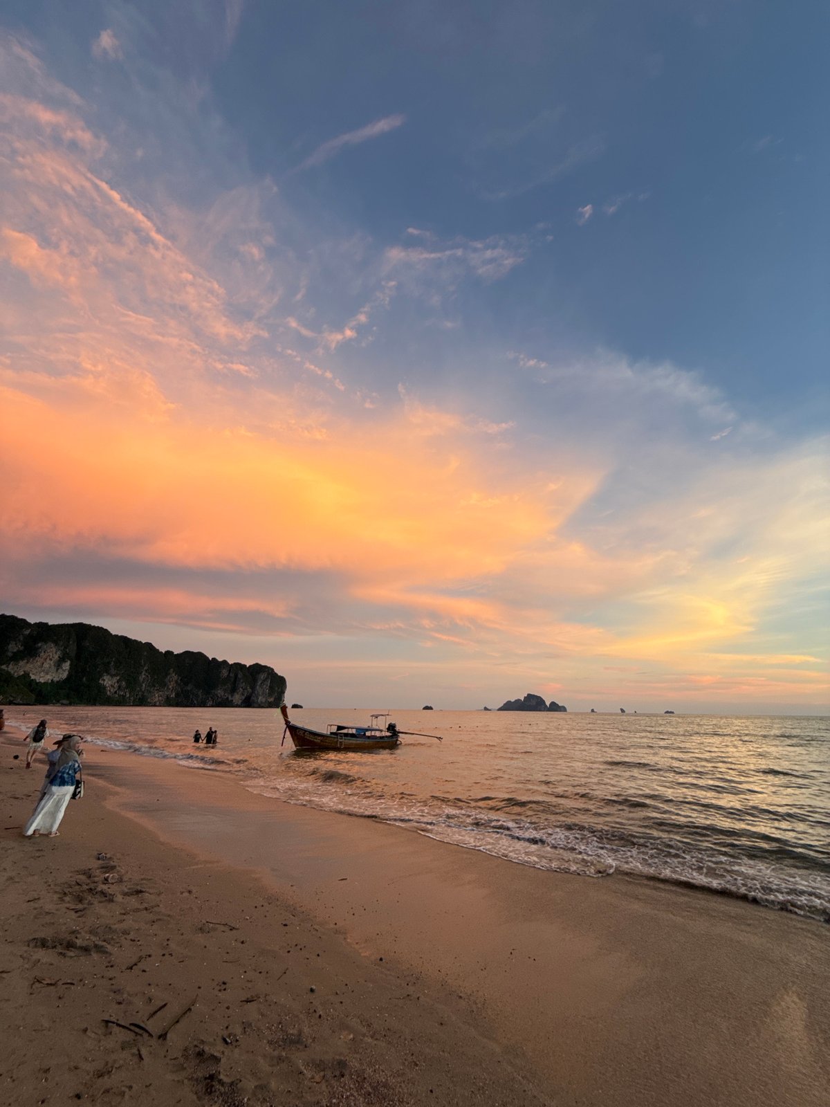 Sunset beach scene documented at Thailand's Ao Nang Beach