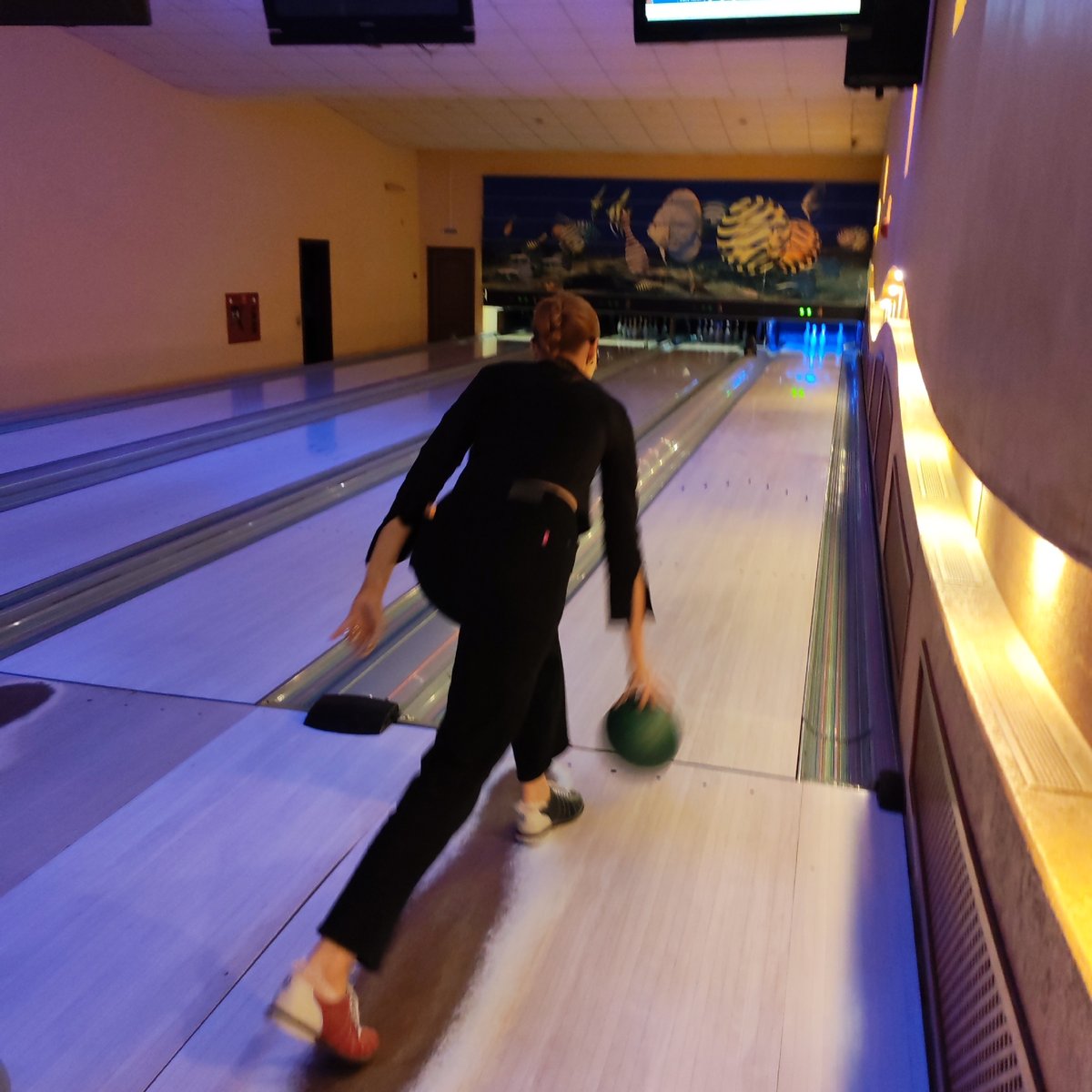 Family bowling outing documented at Chaikovsky entertainment venue