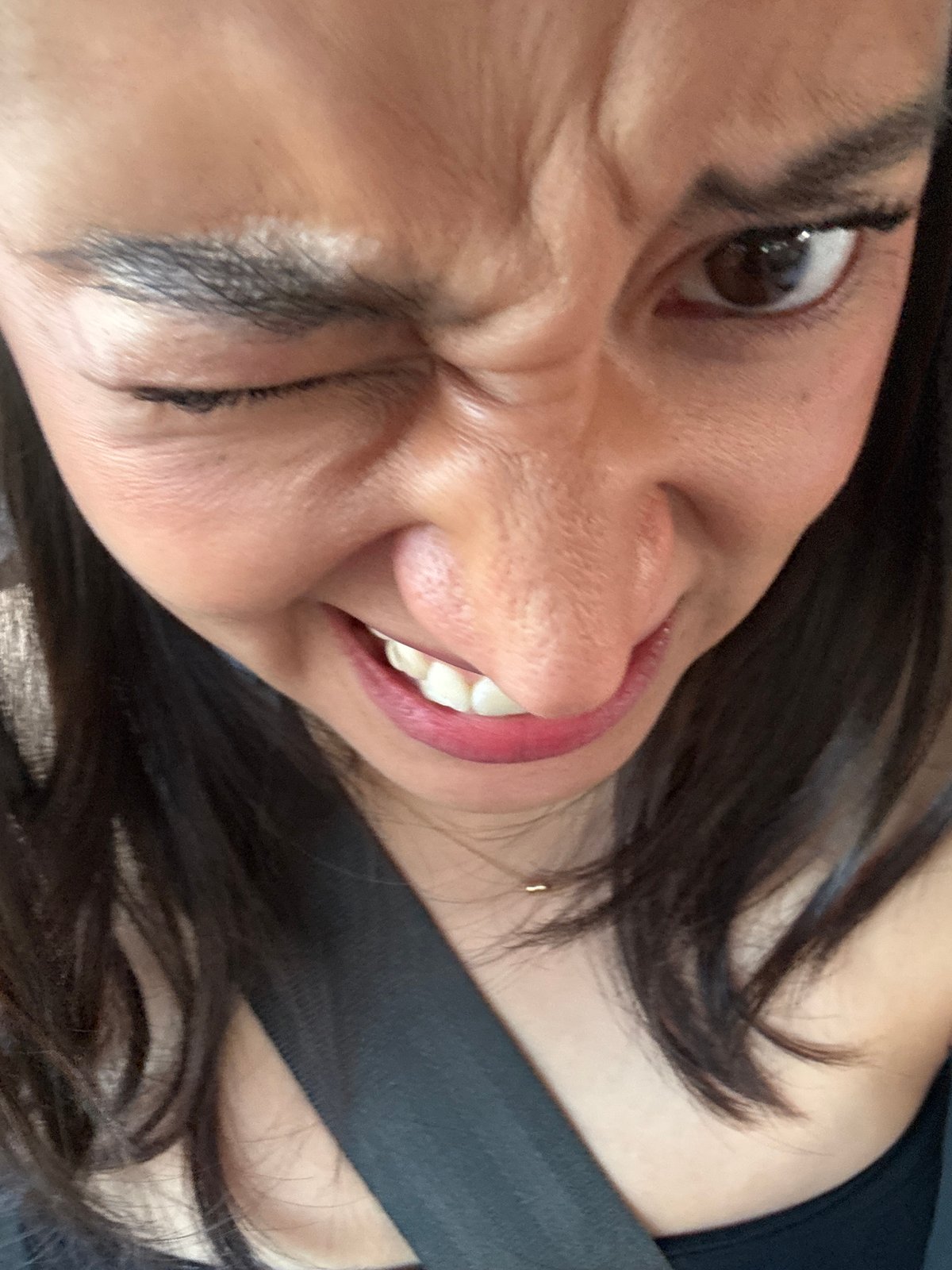 Woman photographed with distressed expression in Puebla, Mexico