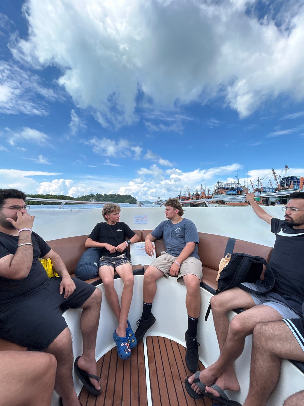 Boat trip through Ratsada waters on cloudy day
