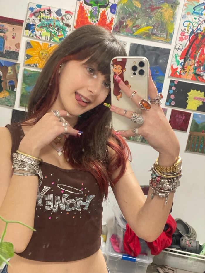 Young woman documents morning in Ra'anana through selfies
