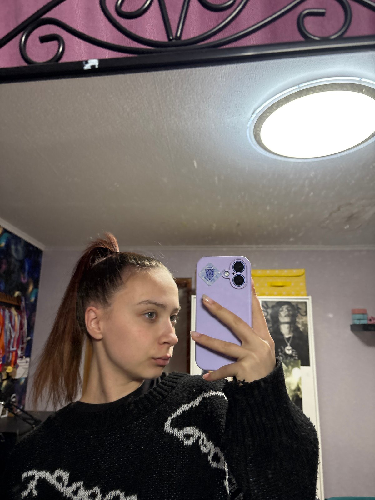 Woman takes selfies in decorated room in Russia