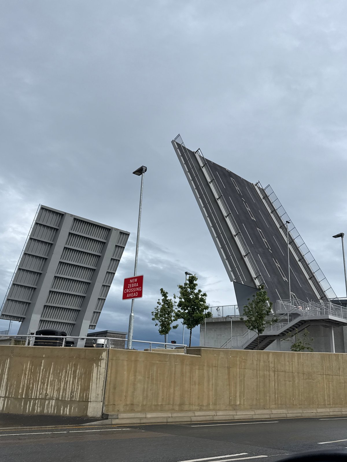 Drawbridge opens in Great Yarmouth under cloudy skies