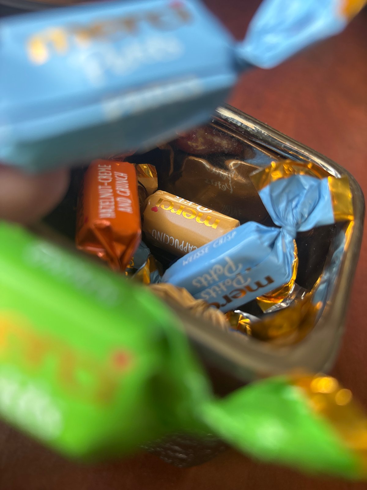 Minsk resident documents chocolate collection in morning candy showcase