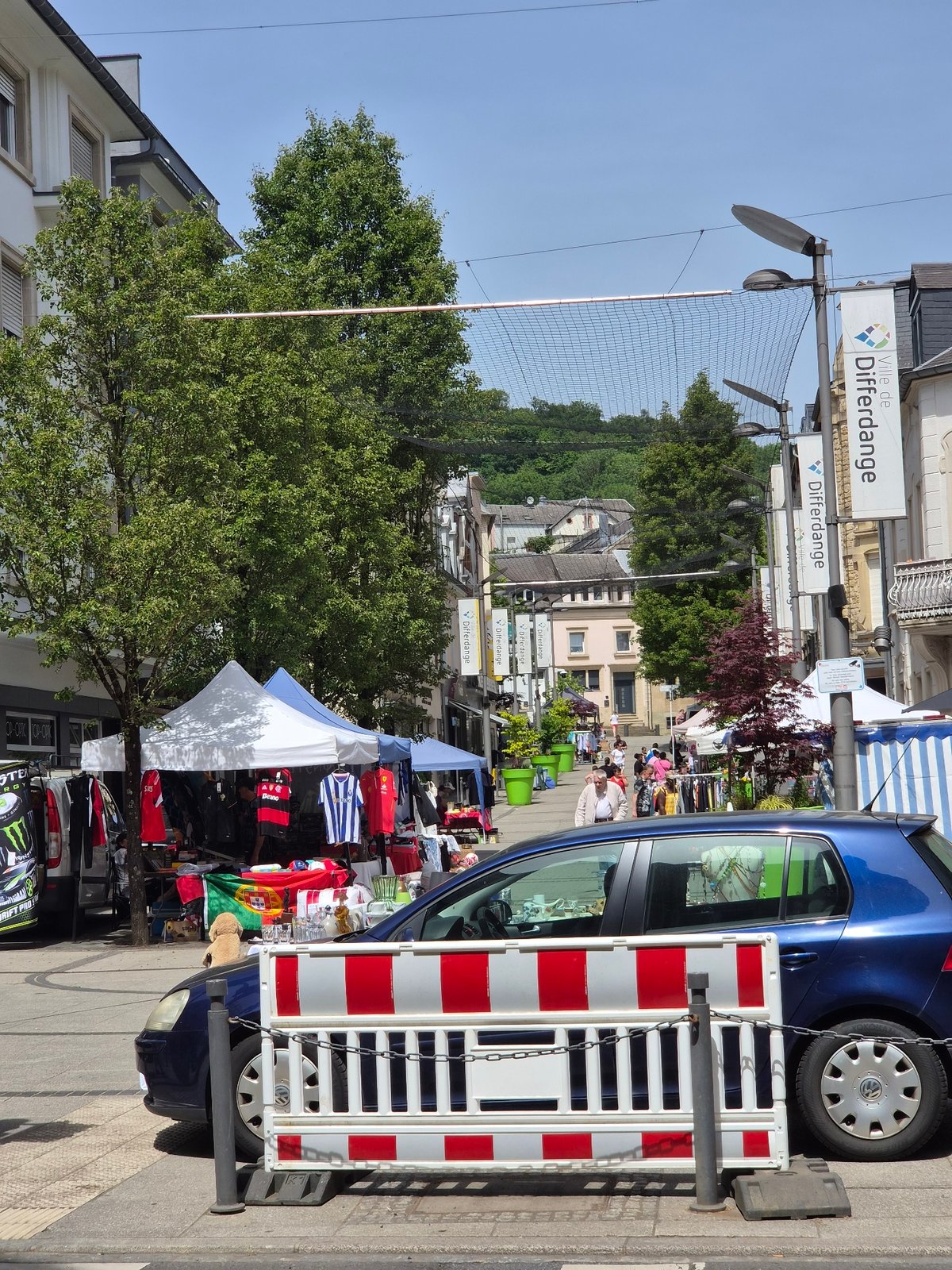 Daily life documented across Differdange, Luxembourg street scenes