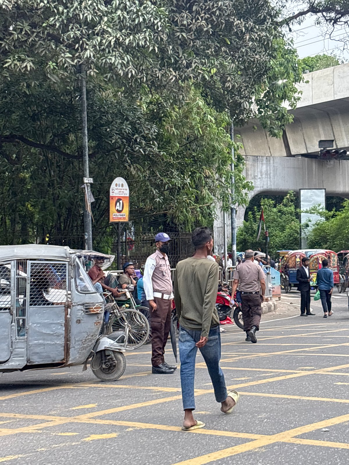 Morning street life documented across central Dhaka