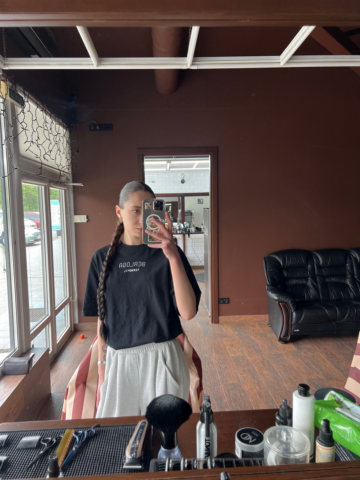 Woman takes selfie at hair salon in Ternopil