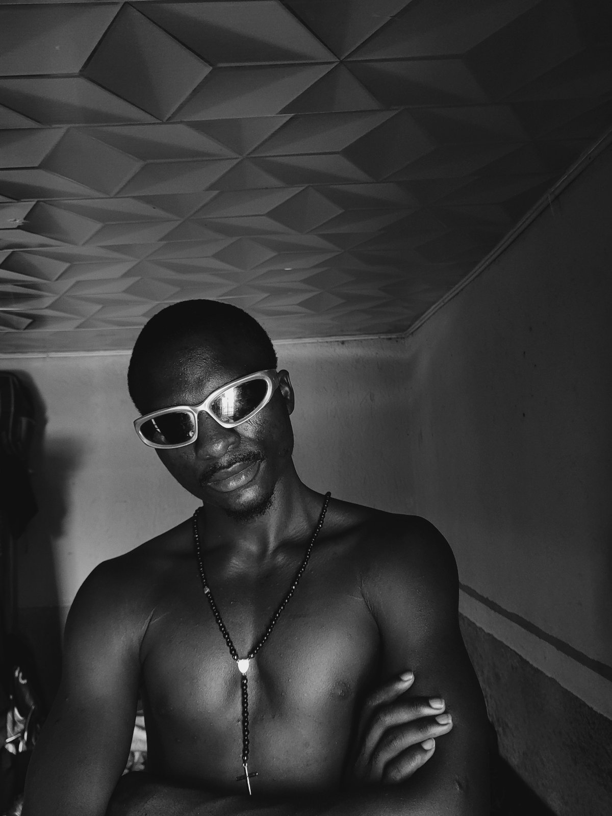 Man photographed in portrait session in Bukuru, Nigeria