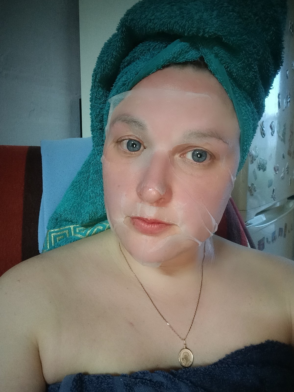 Woman takes selfie during skincare routine in Chaikovsky, Russia