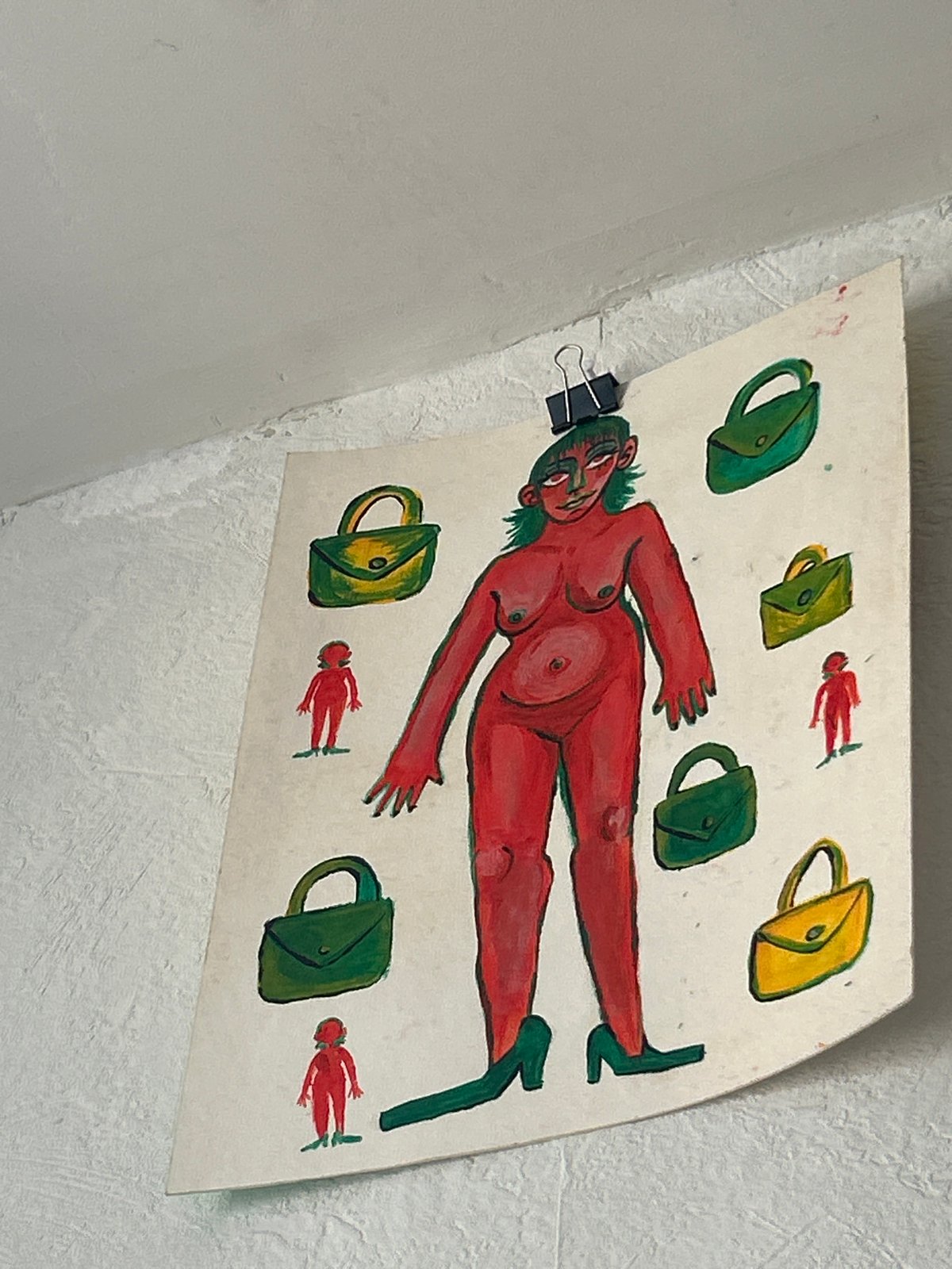 Interior artistic space documented with paintings, decorations, vintage poster