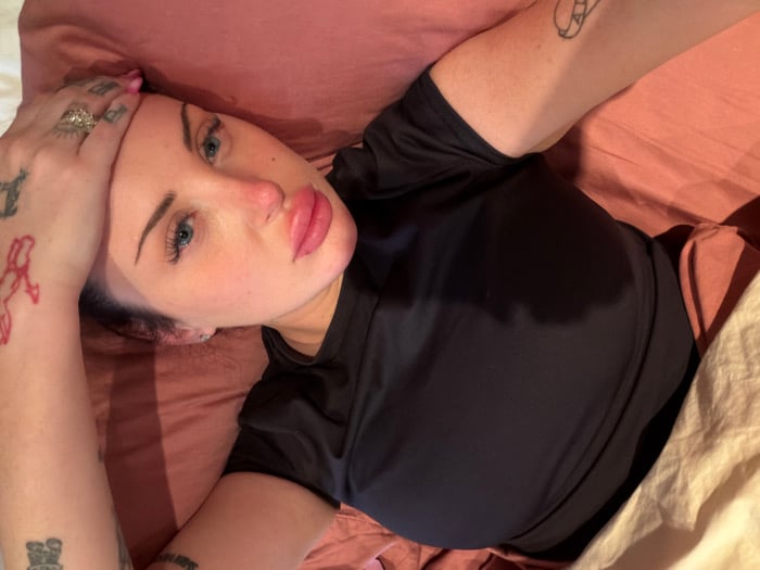 Woman resting in bed observed in Los Angeles