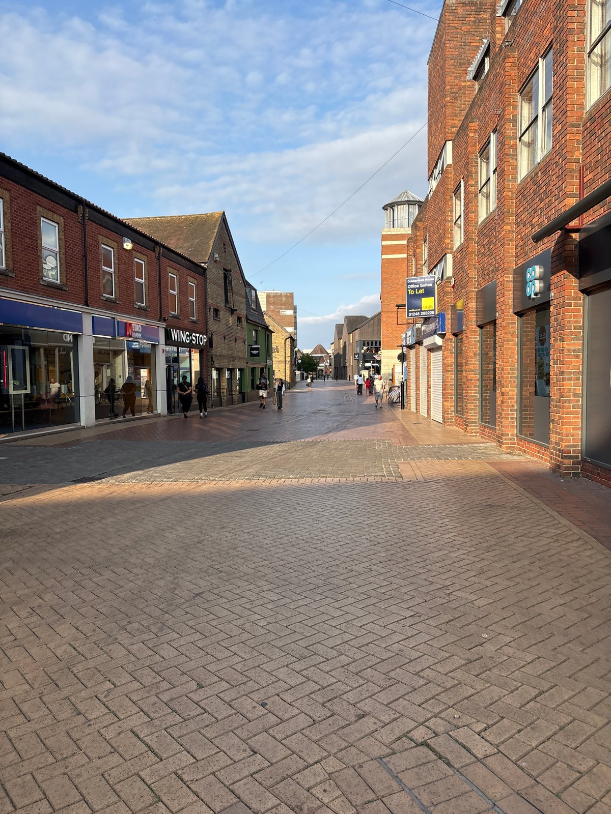Chelmsford city center: high street and river on a summer afternoon