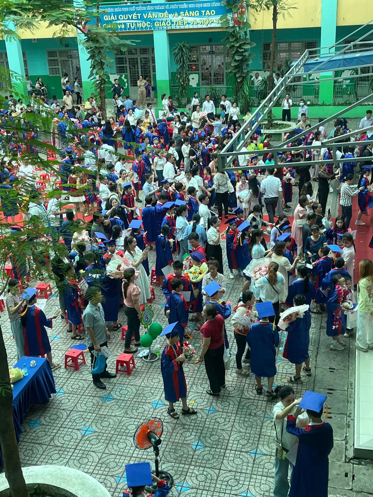 Outdoor graduation ceremony held in Thuận An school courtyard