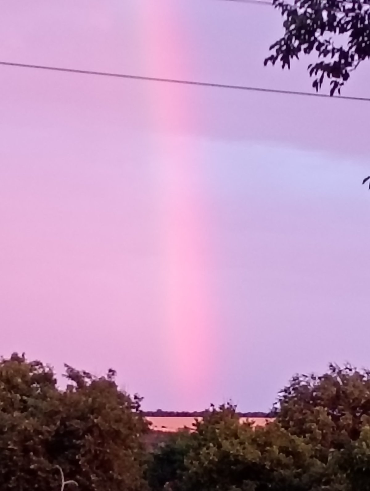 Storm gives way to vivid sunset over rural Marynivka