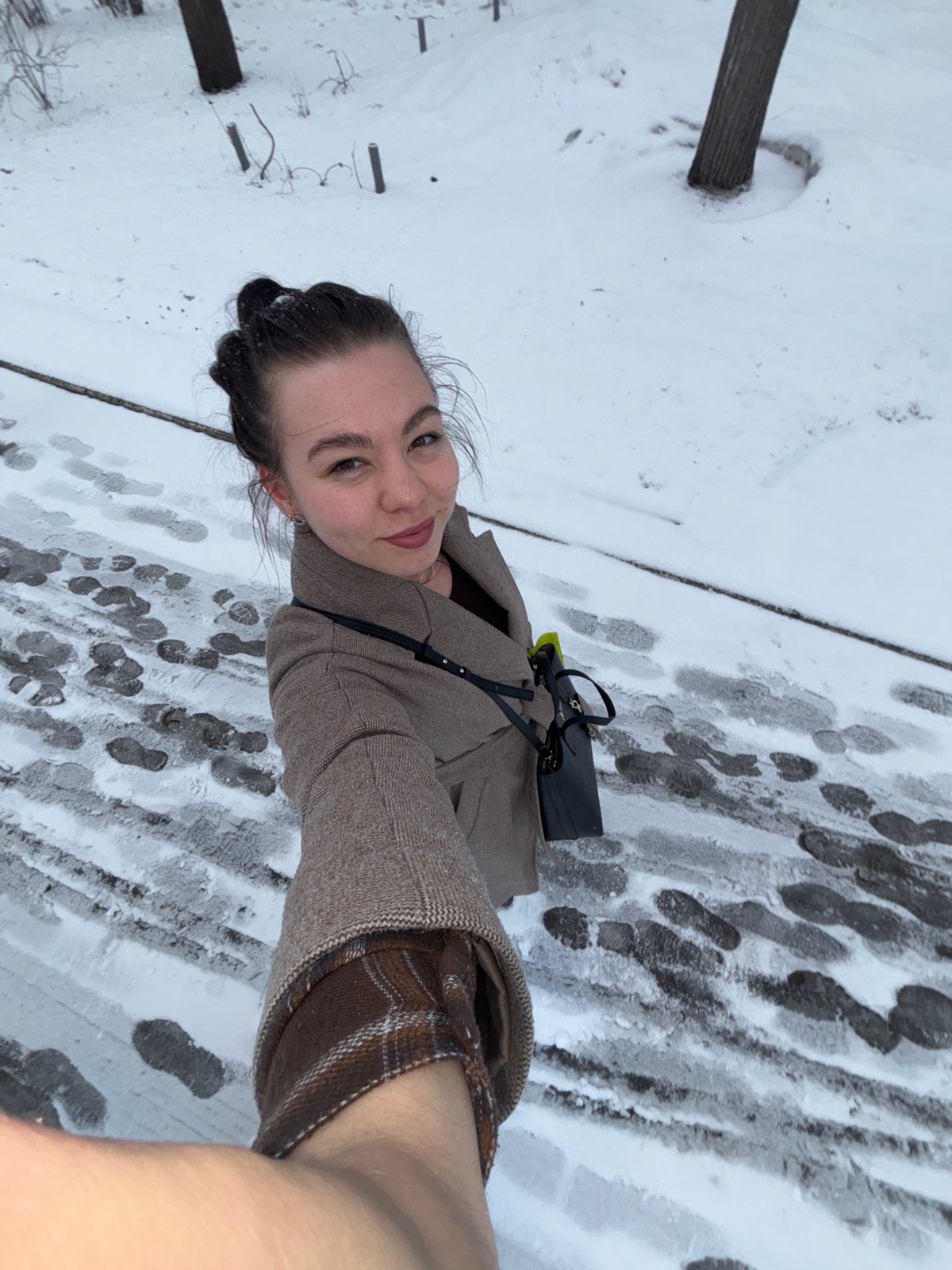 Woman takes selfies in snowy Perm, Russia