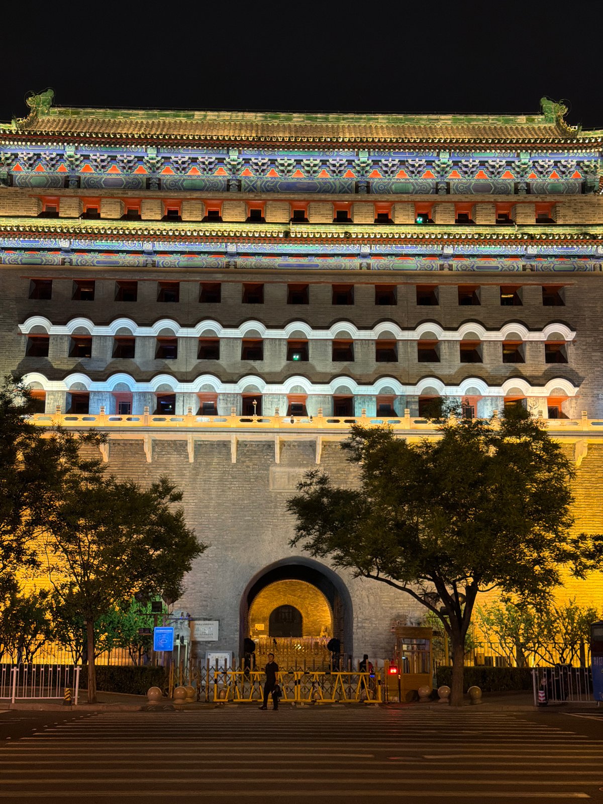 Nighttime view of imperial Chinese gate structure captured