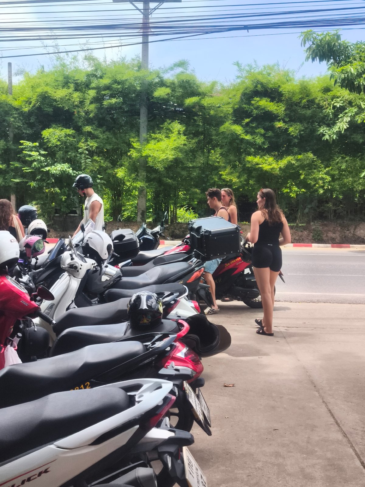 Coffee and pastries at a cafe, motorcycles parked nearby outside