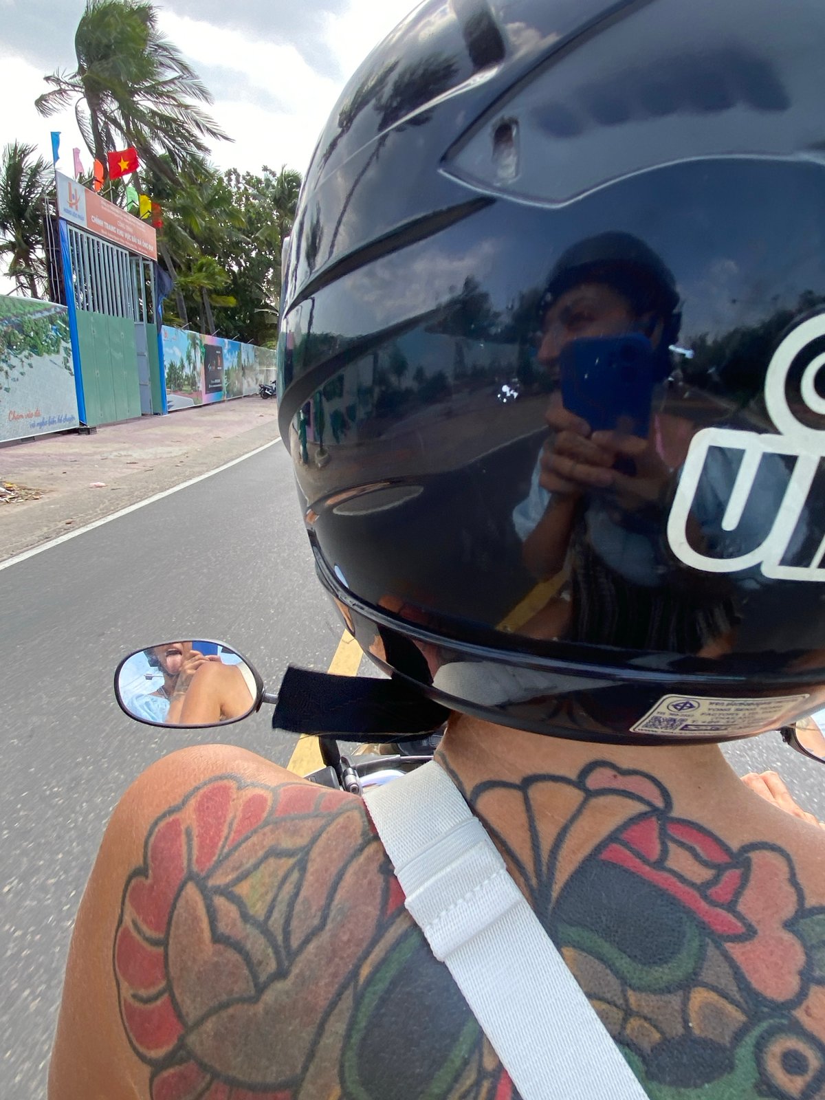 Motorcycle riders travel through Phu Thuy Ward streets