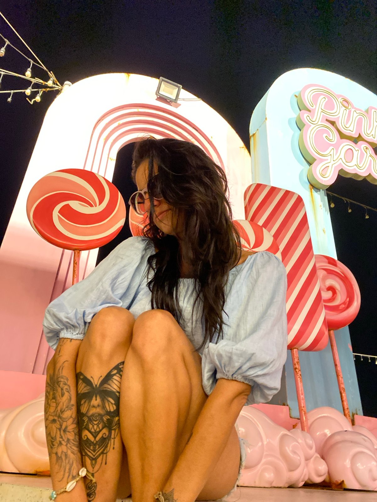 Woman poses at candy-themed attraction in Vietnam