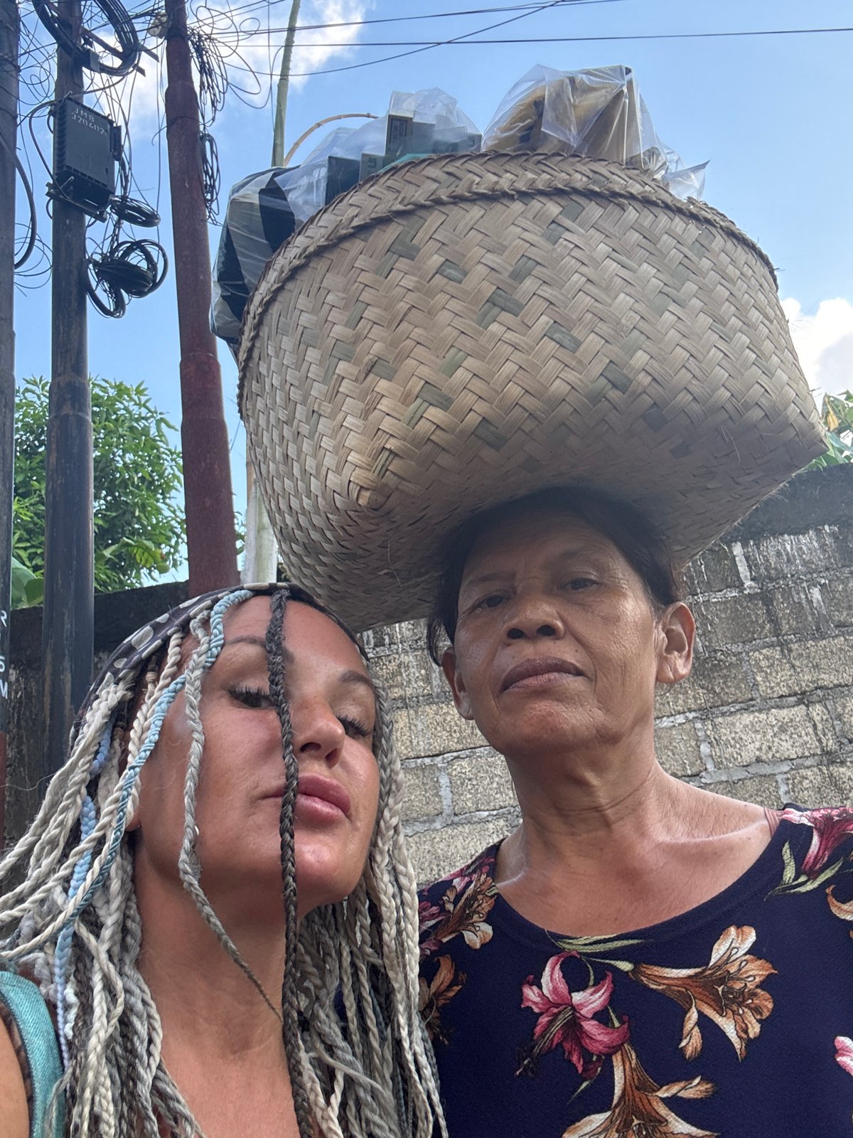 Street vendors and traditional architecture documented in Kuta
