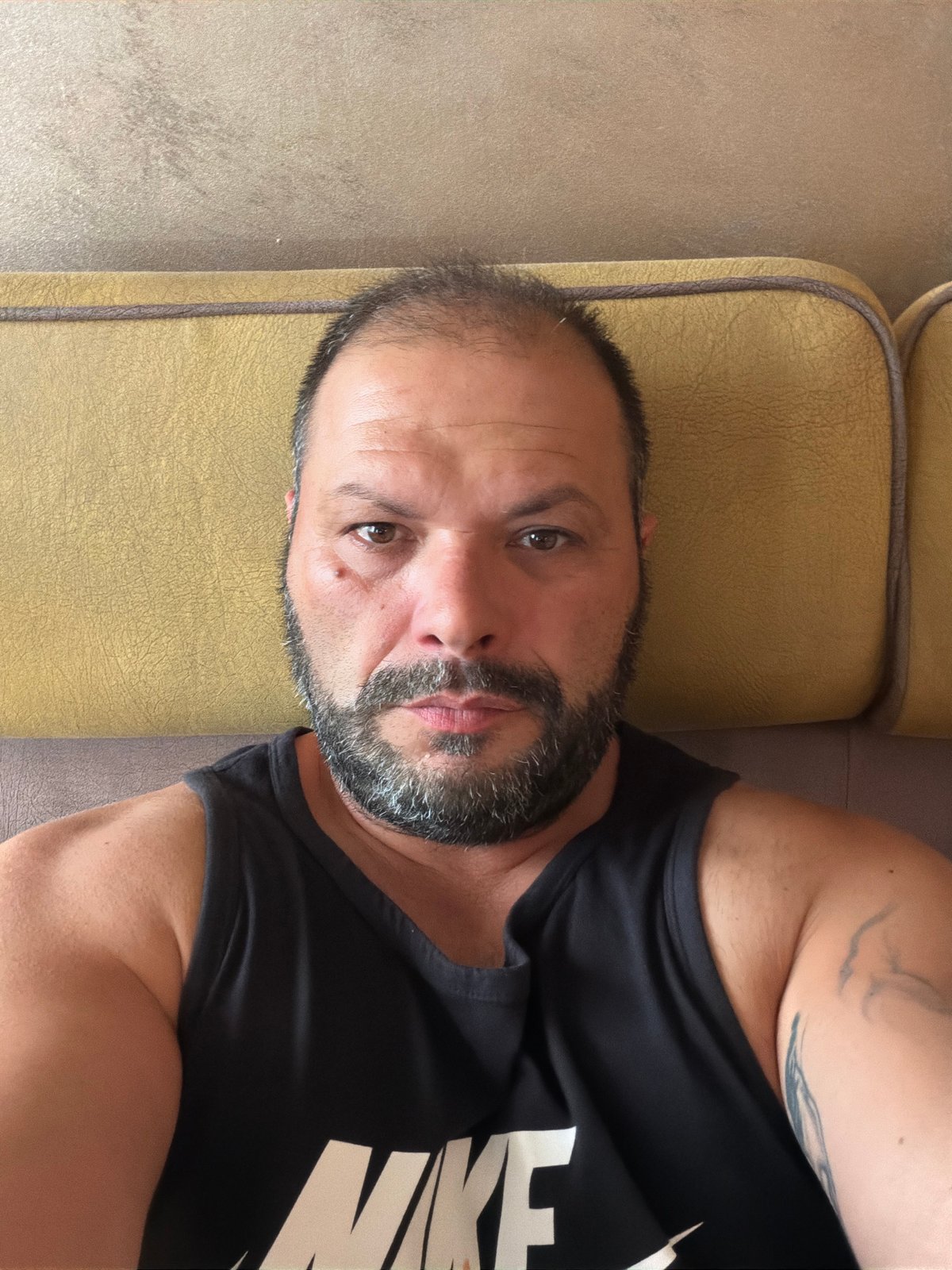 Couch selfies from a Burgas apartment, one minute apart.