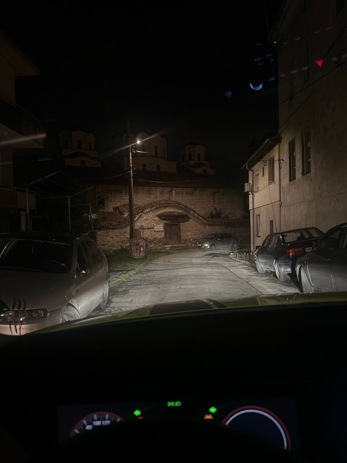 Taxi ride documented through urban streets during evening hours