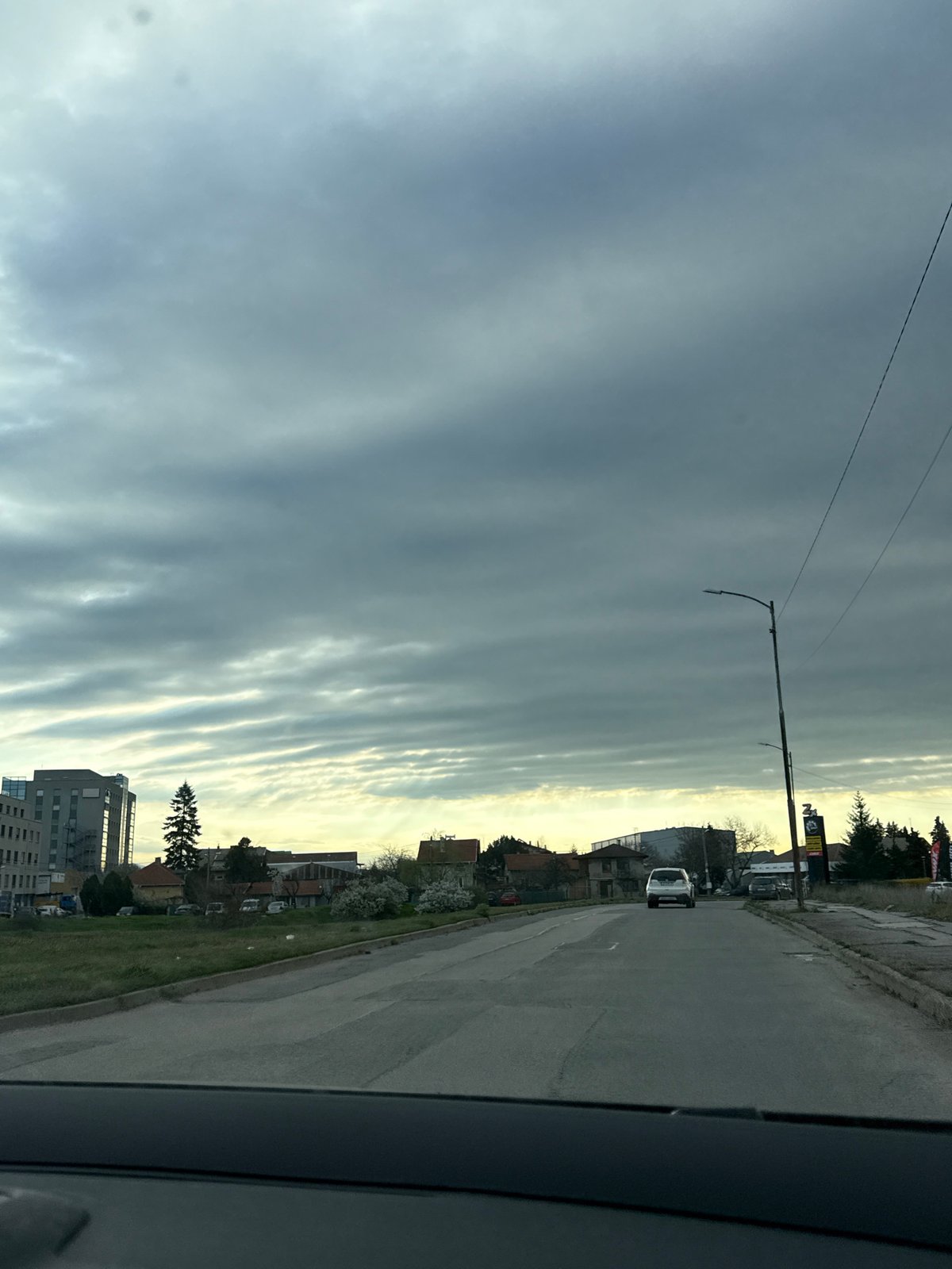 Morning commute observed in Sofia under patterned overcast skies