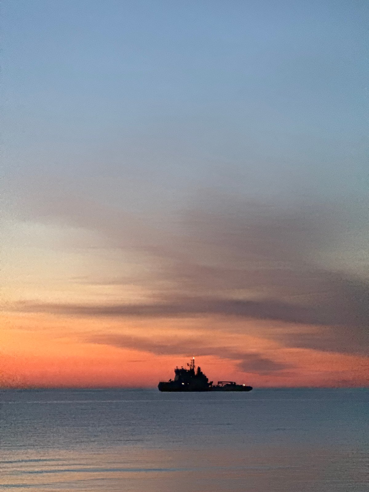 Tallinn waterfront sunset documented over Baltic Sea and marina