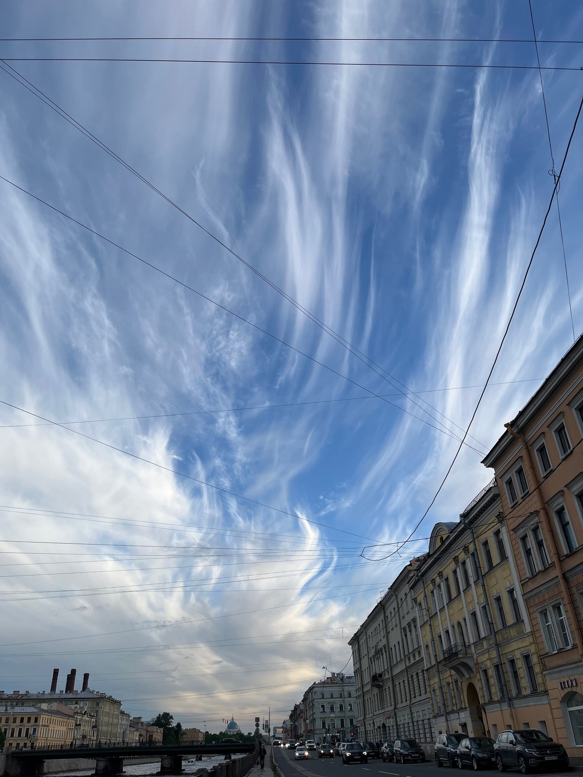 Witness documents Saint Petersburg streetscapes and skies during afternoon walk