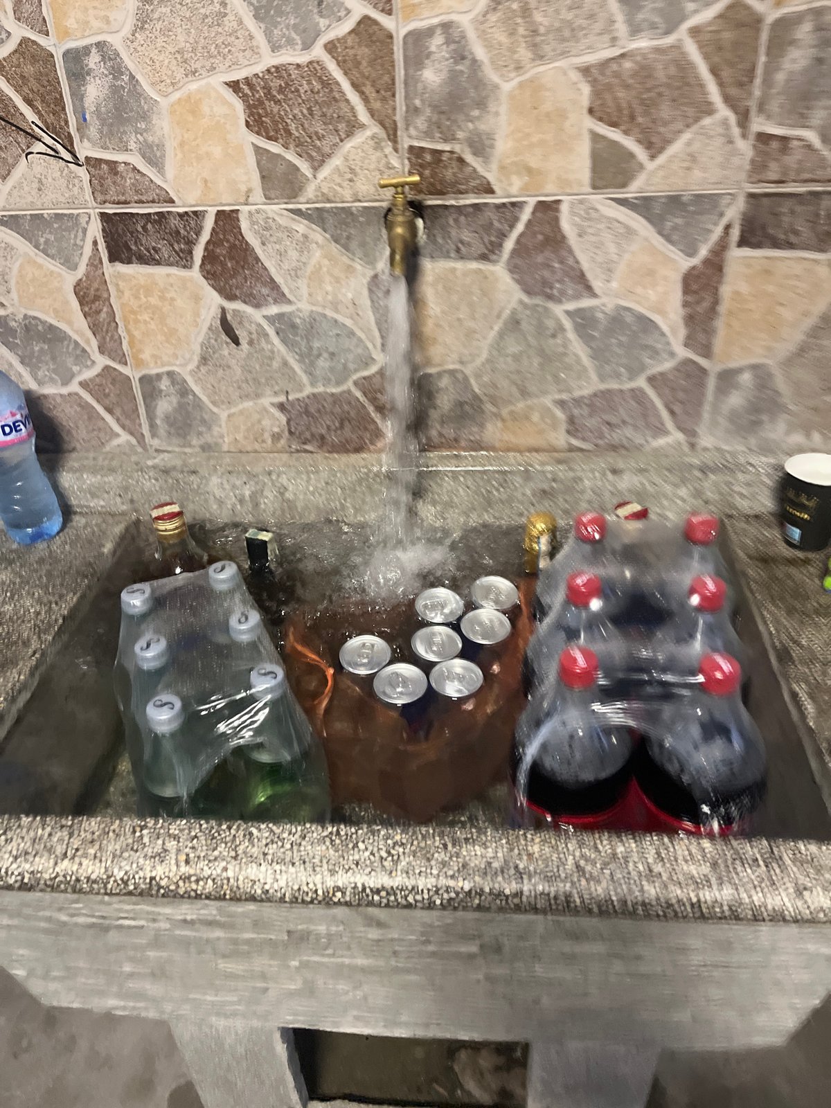 Utility sink with brass tap documented in Pazardzhik