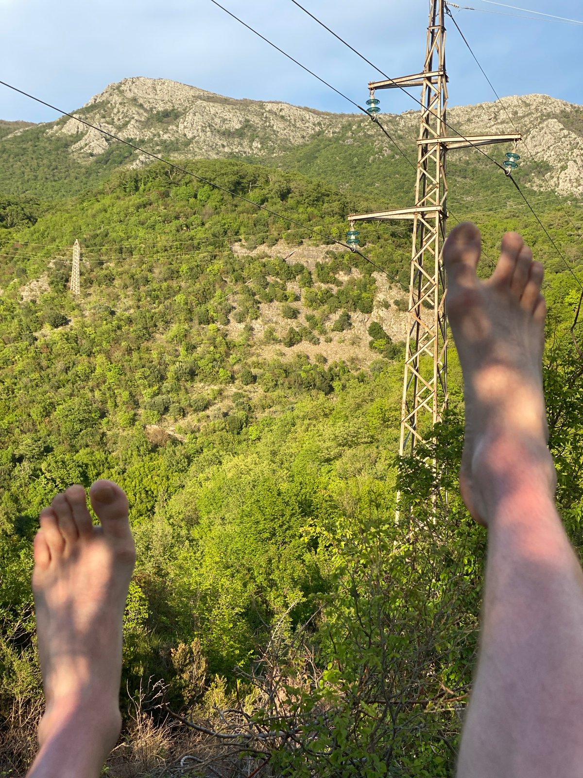 Hiker captures barefoot mountain view in Montenegro