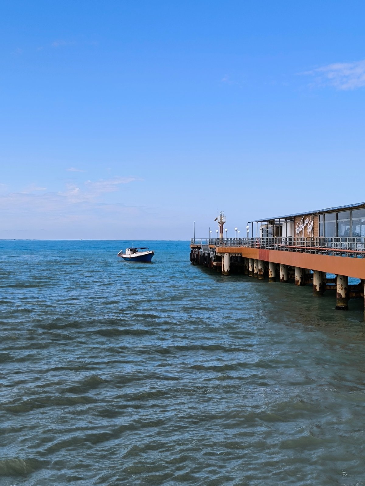 Sochi's Black Sea waterfront and parkways on a summer morning