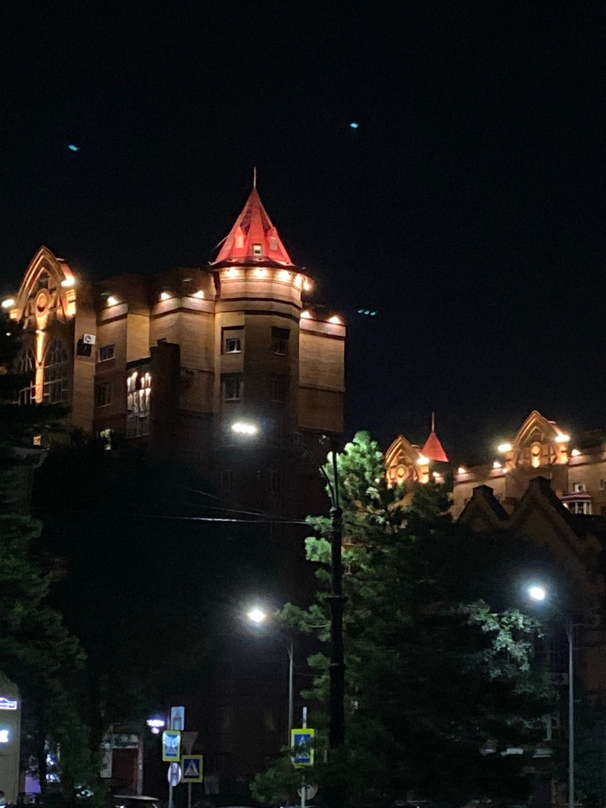 Blagoveshchensk embankment lit up along the Amur at night