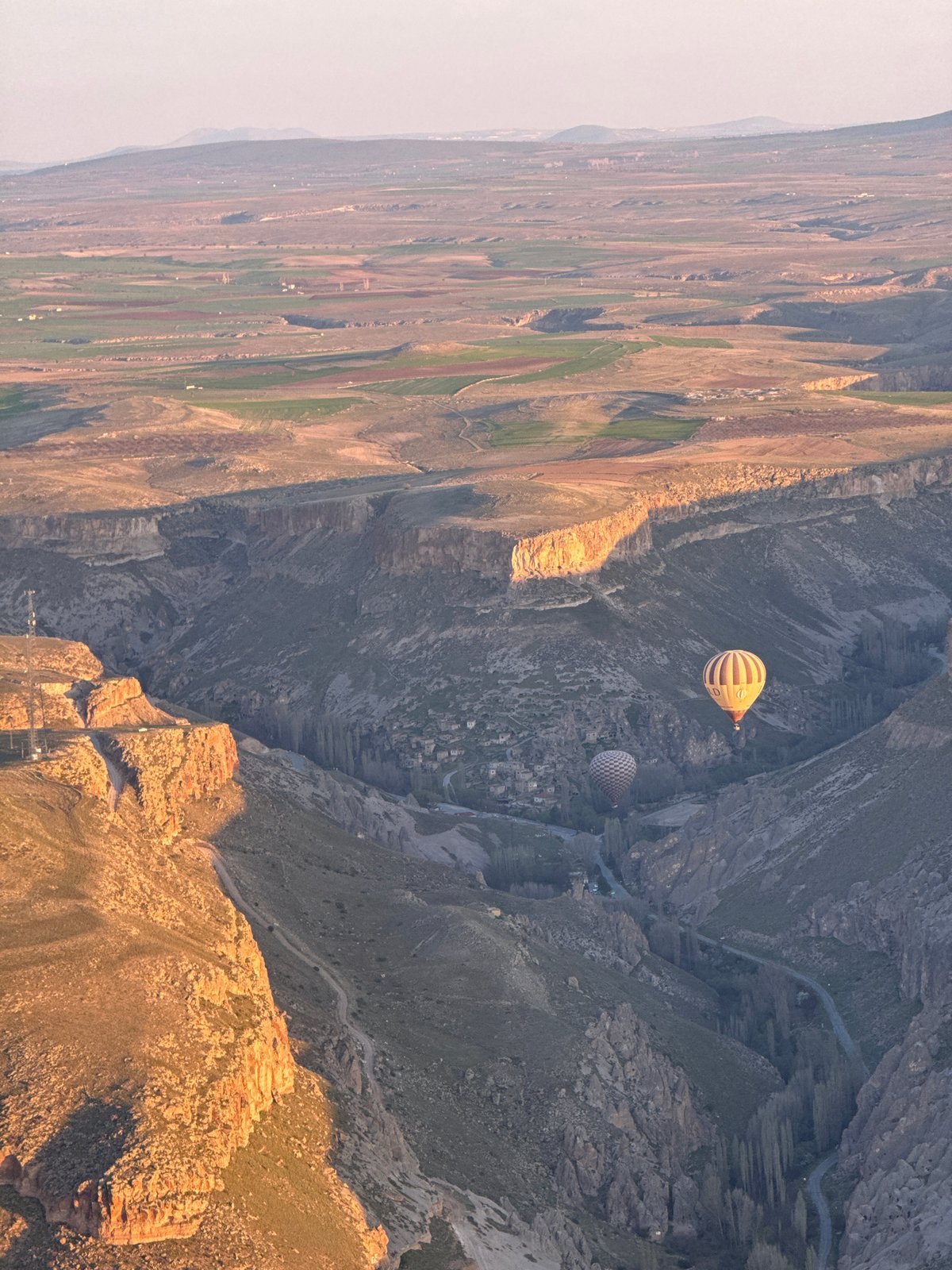 Hot air balloon sunrise flight over Yeşilhisar canyon documented